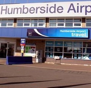 Passenger lands plane, pilot dies after at Humberside Airport.