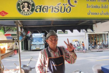 Bangkok coffee vendor removes logo in Starbucks settlement